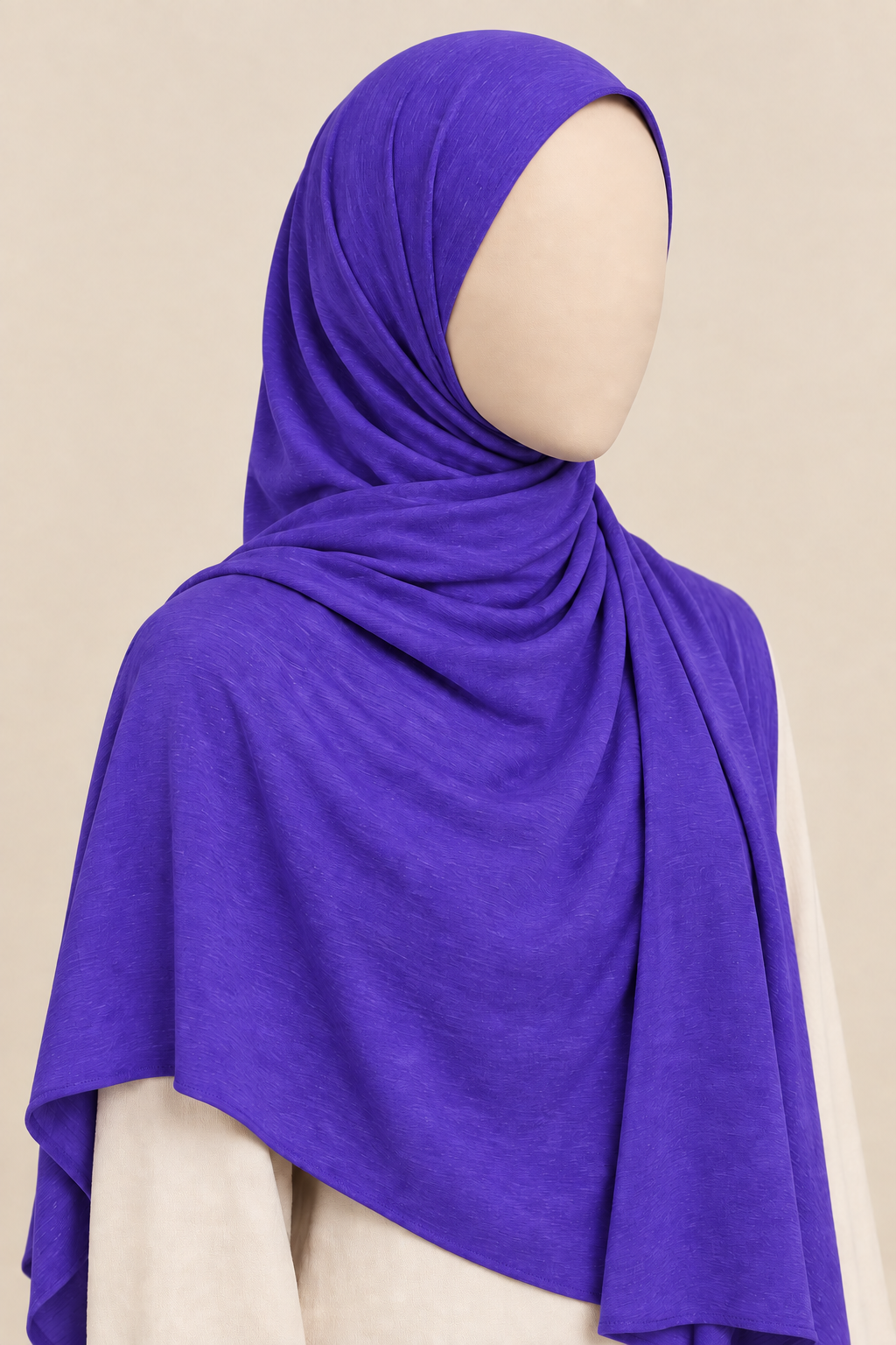 Faceless model wearing a vivid purple modal slub hijab