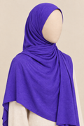 Faceless model wearing a vivid purple modal slub hijab