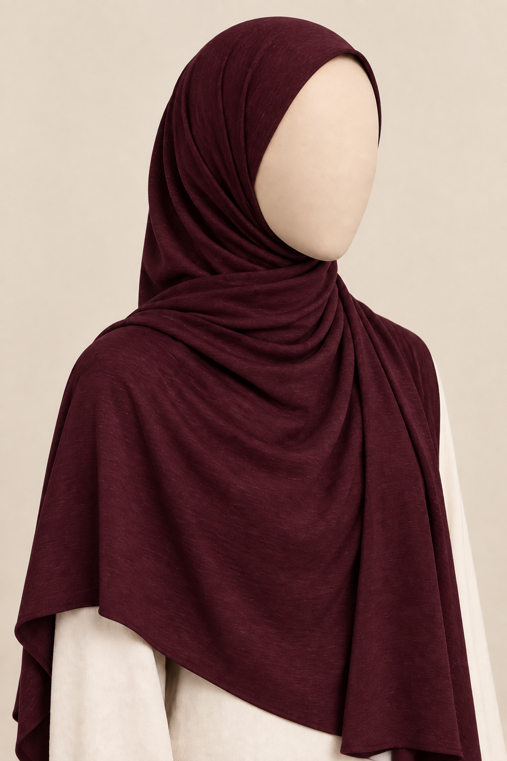 Faceless model wearing a dark burgundy modal slub hijab