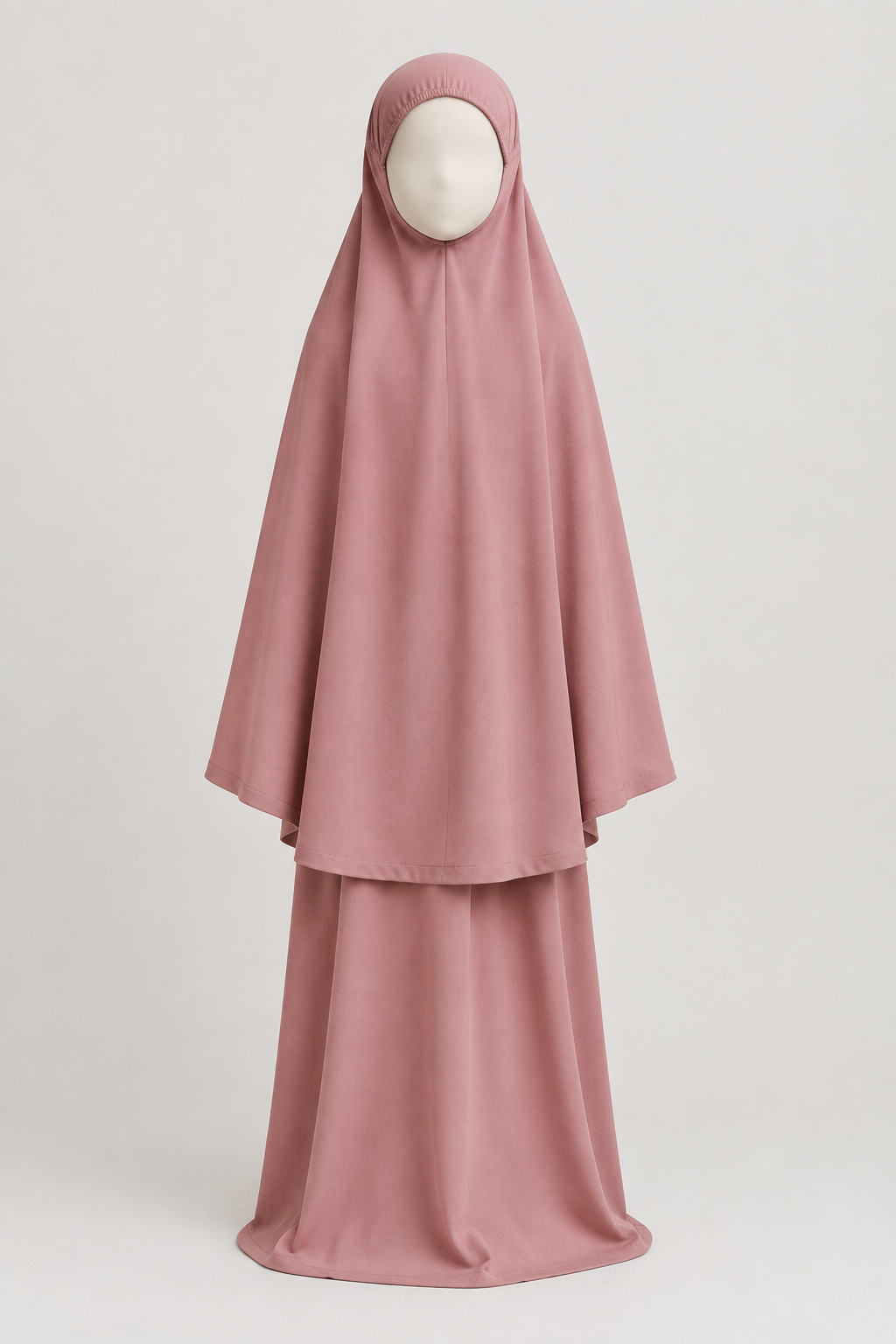 Full-length dusty-rose girls' prayer outfit with matching head covering on a child-sized faceless mannequin