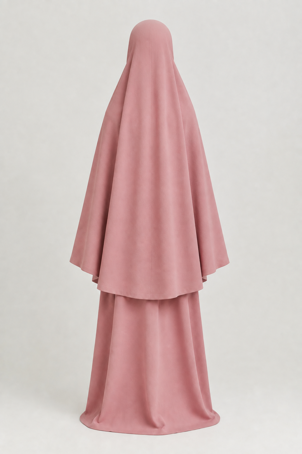 Back view of the dusty-rose girls' prayer outfit with a smooth, rounded head covering on a child-sized faceless mannequin