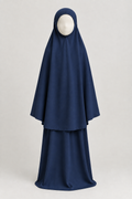 Front view of the girls' prayer outfit in navy blue, on a child-sized faceless mannequin